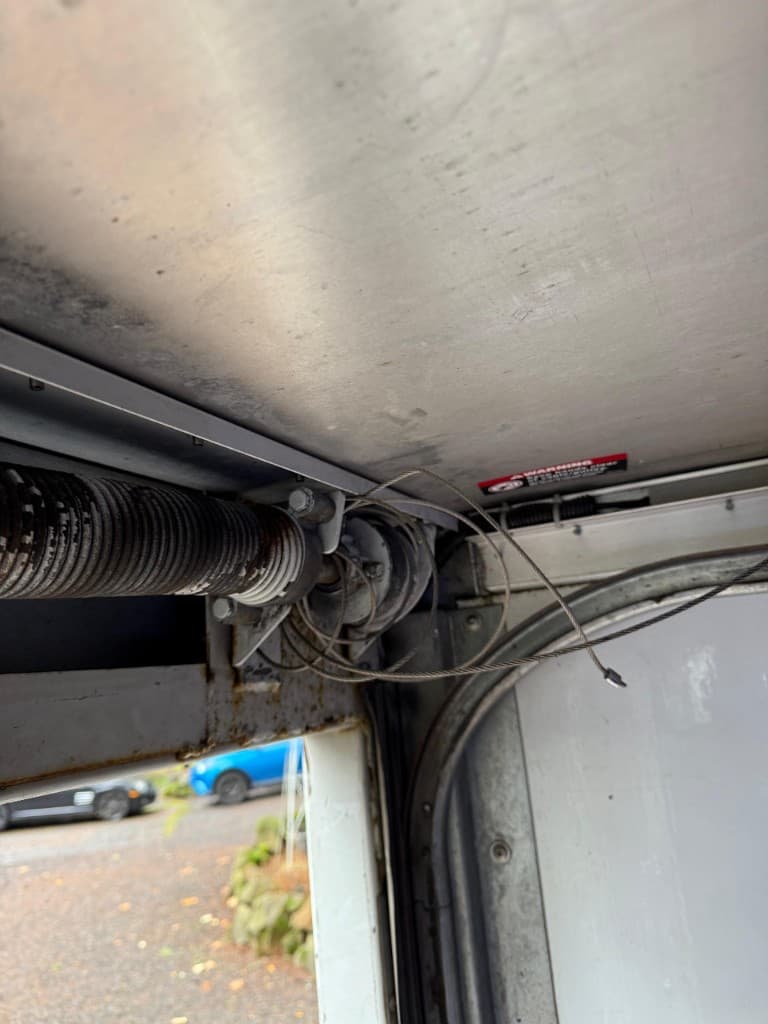 Tangled and snapped garage door lift cable off the drum in Portland and Salem Metro — Cable Repair