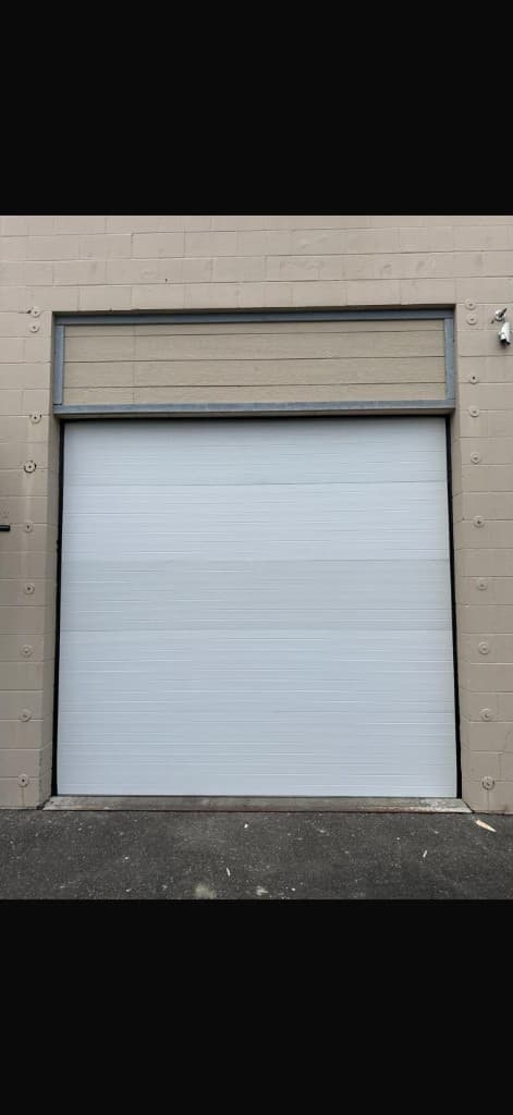Commercial Garage Doors on a Pacific Northwest home professional garage door service in Portland and Salem Metro