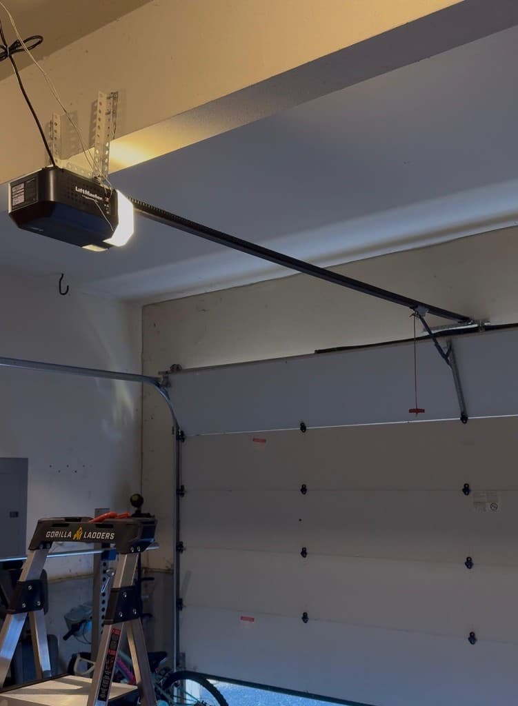Garage door balance test after spring installation with LiftMaster opener in Portland and Salem Metro — Spring Repair