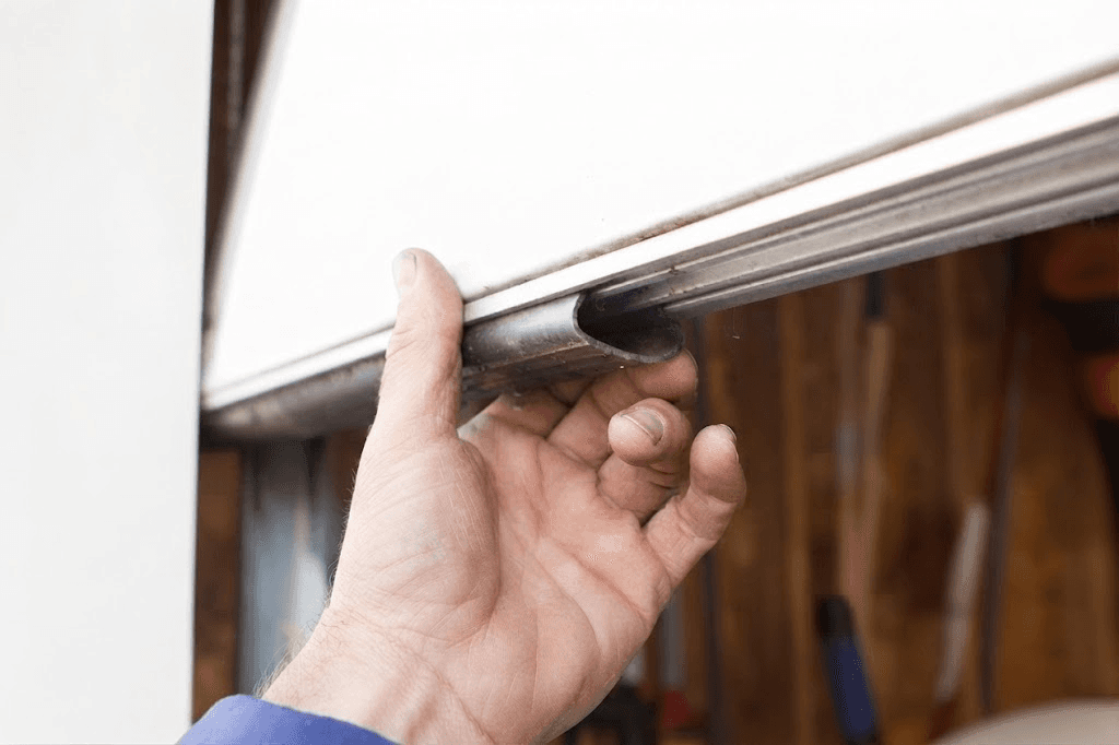 Weather Strip Replacement on a Pacific Northwest home professional garage door service in Portland and Salem Metro